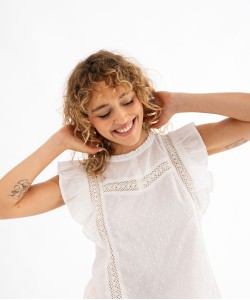 Blouse sans manches en plumetis à volant femme